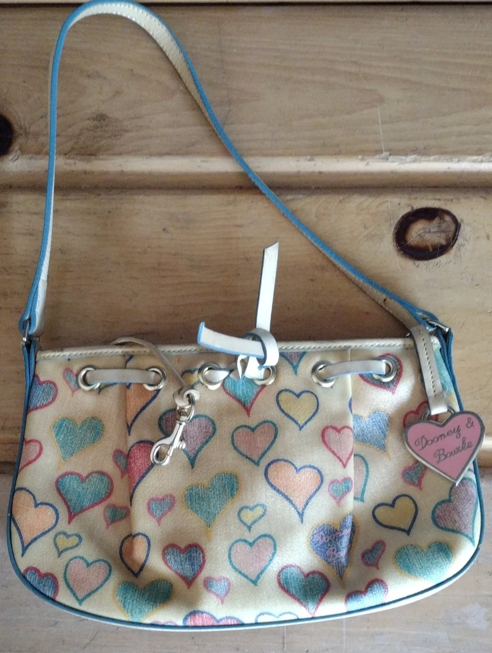 Dooney & Bourke Cream Shoulder Bag with Multicolor Heart Print